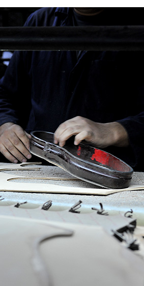 inventeur de la chaussure rehaussante